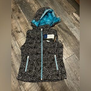 Women's Black, and teal Puffer Vest with white letters "GOLF"